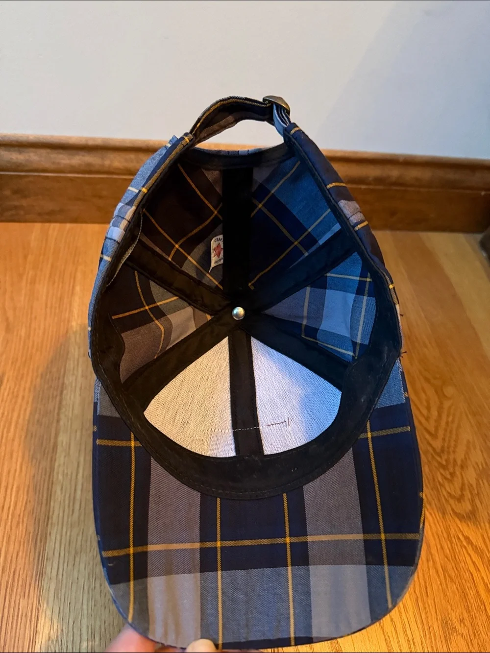Love your melon plaid hat with leather logo